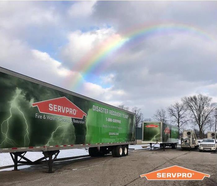 SERVPRO trailer with rainbow over it 
